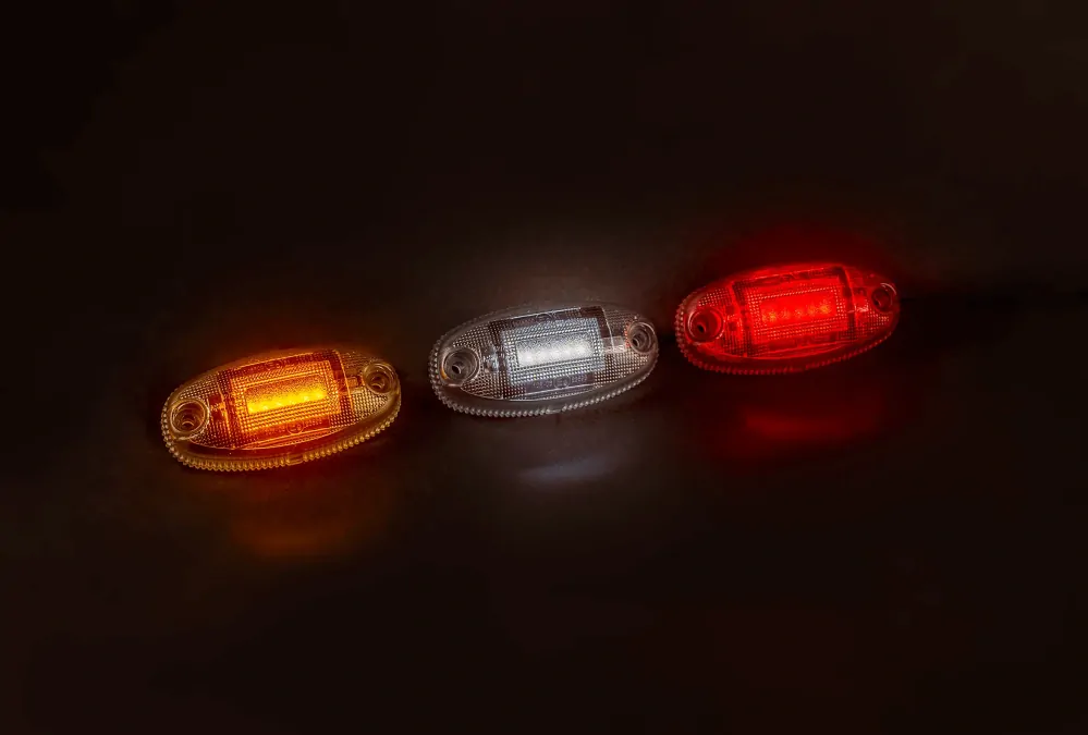 LED poziční světlo 12-36V- zatmavená červená