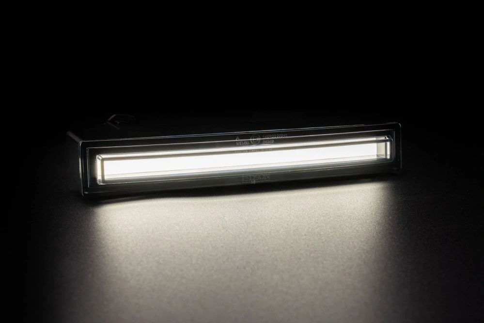 LED poziční světlo do sluneční clony Scania Next Gen– Ledson Optoline NG+, bílé/oranžové