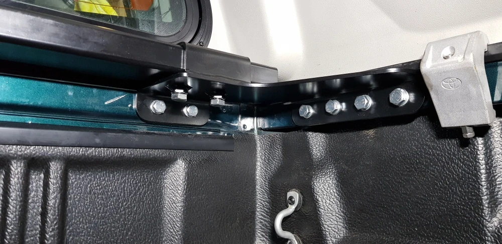 Držák navijáku do korby